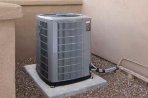Should my AC drain pan be full of water?